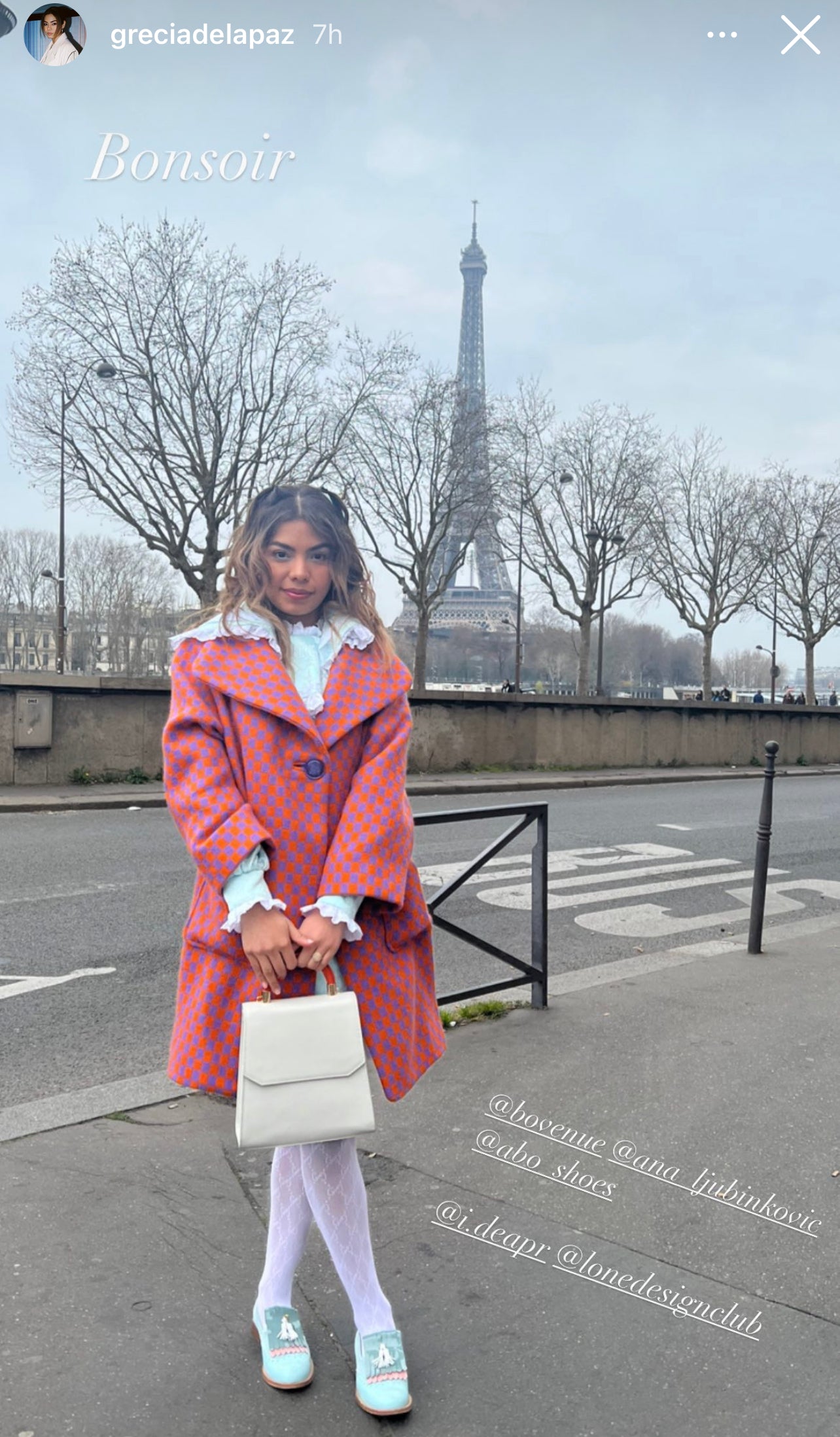 Grecia De La Paz front row at PFW shows with her Laila in Powder White