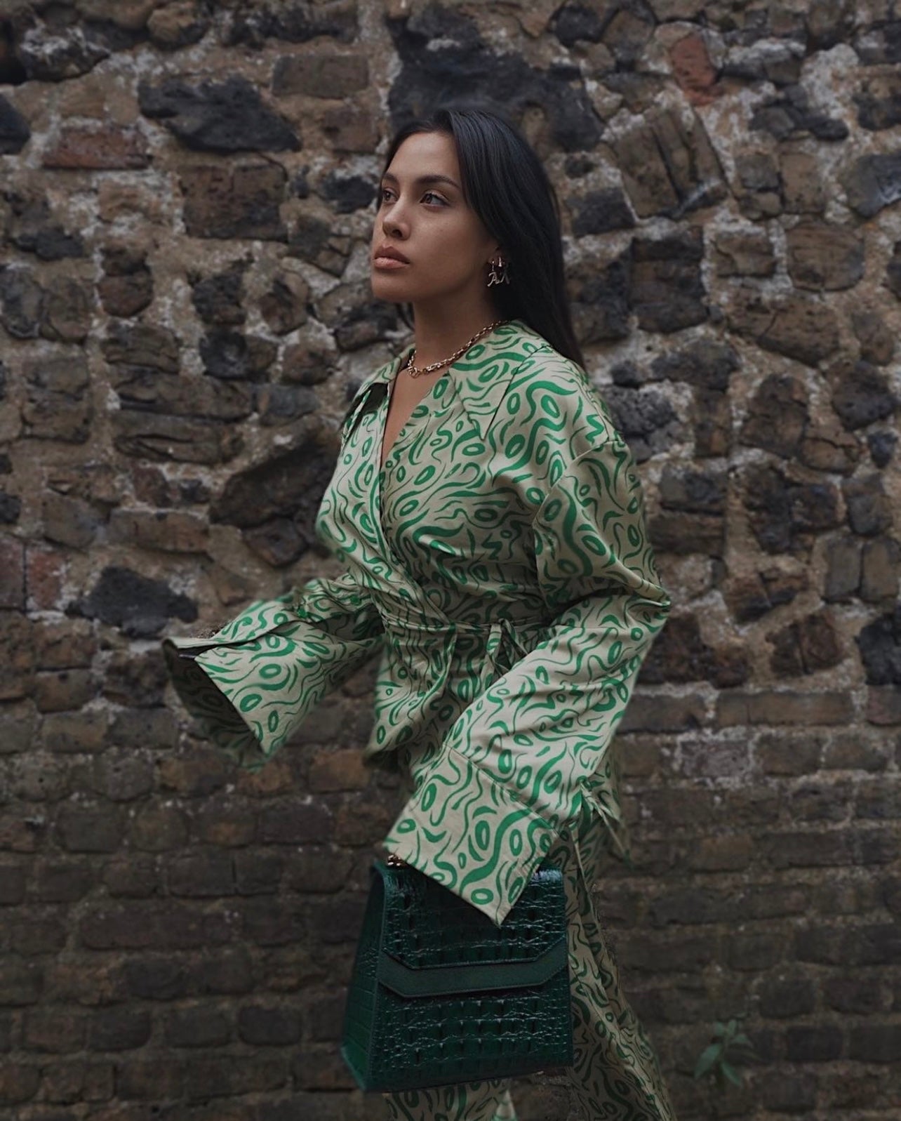 Ana Fenec-Nabokov wearing NOURA in Royal Green to LFW