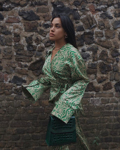 Ana Fenec-Nabokov wearing NOURA in Royal Green to LFW